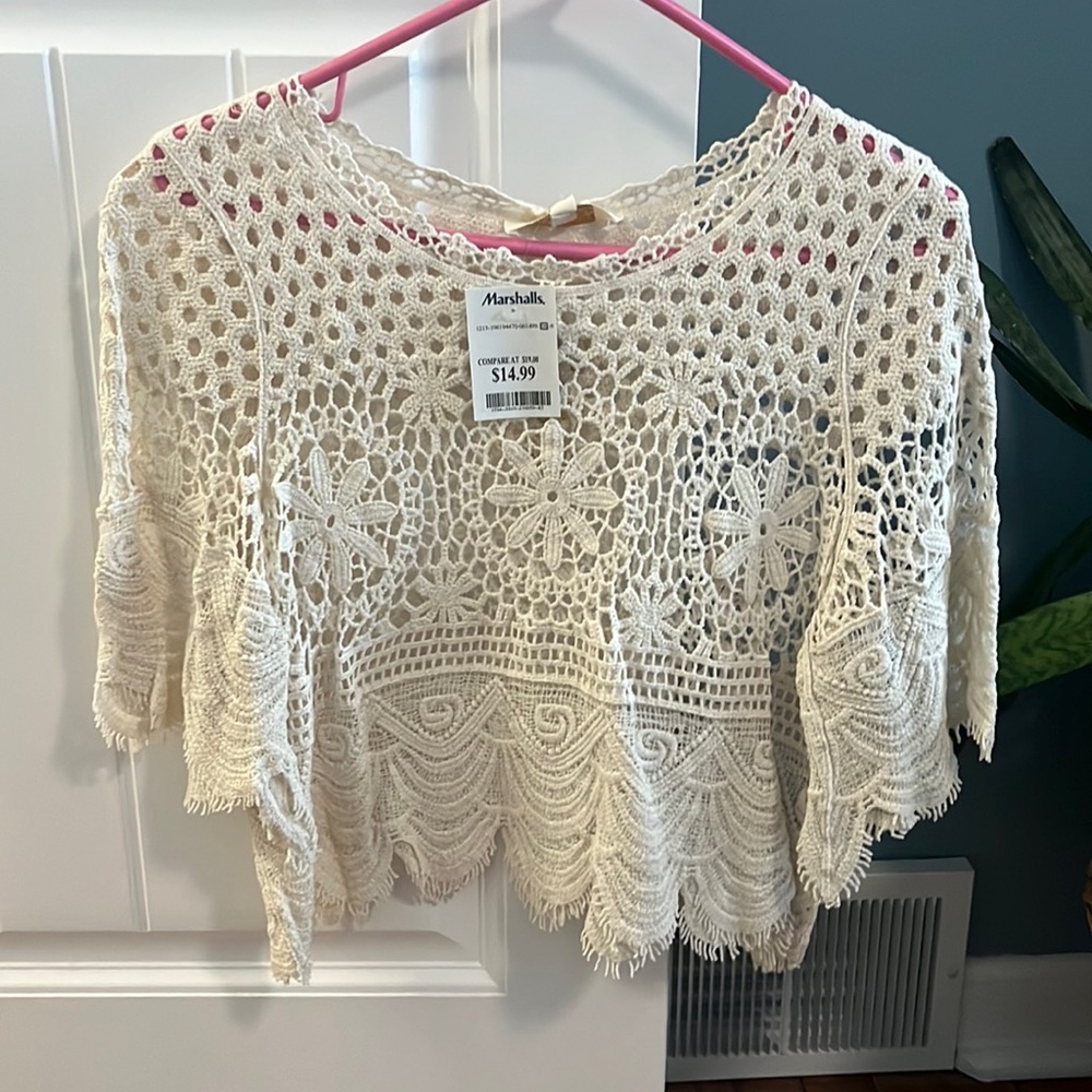 Brand new women’s see through knit shirt.